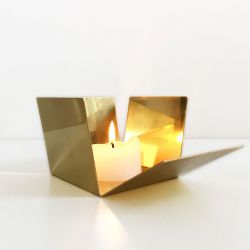 Golden candle holder with mirror effect